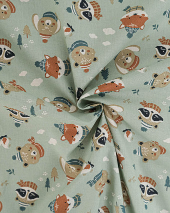 Tissu Coton Motif Animaux en Hiver Fond Vert - Mercerine
