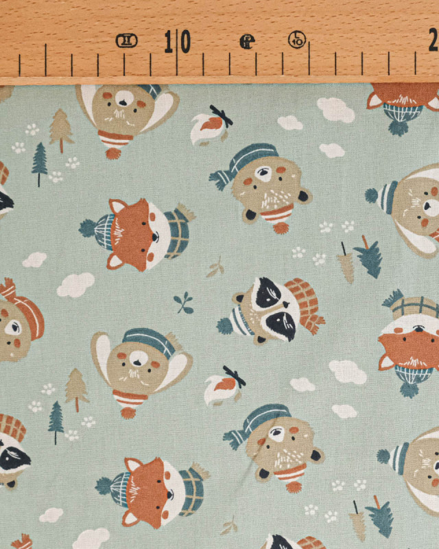 Tissu Coton Motif Animaux en Hiver Fond Vert - Mercerine