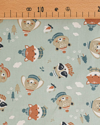 Tissu Coton Motif Animaux en Hiver Fond Vert - Mercerine