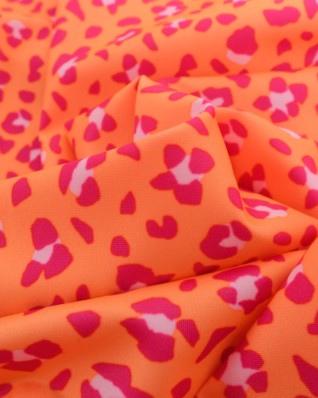 Tissu lycra Garou Rose sur Fond Orange  - Mercerine