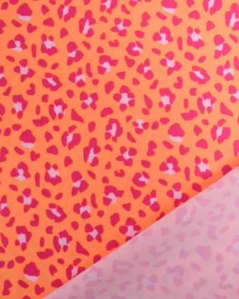 Tissu lycra Garou Rose sur Fond Orange  - Mercerine