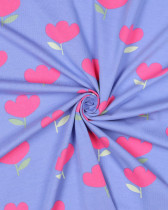 Jersey de Coton Motif Tulipes Roses Fond Bleu