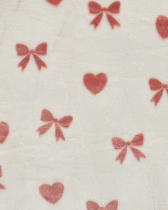 Tissu Doudou Motif Nœud et Cœur Fond Ecru - Mercerine