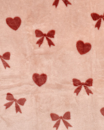Tissu Doudou Motif Nœud et Cœur Fond Rose - Mercerine