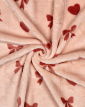 Tissu Doudou Motif Nœud et Cœur Fond Rose