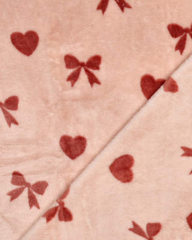 Tissu Doudou Motif Nœud et Cœur Fond Rose - Mercerine