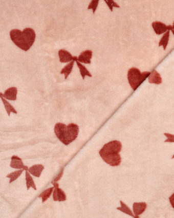 Tissu Doudou Motif Nœud et Cœur Fond Rose - Mercerine