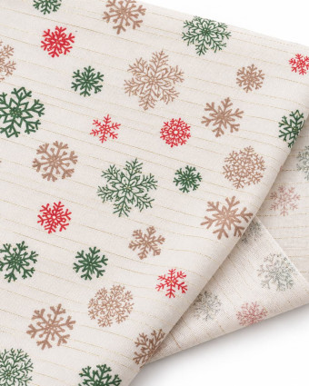 Tissu Noël écru à flocons rouges et verts | Mercerine