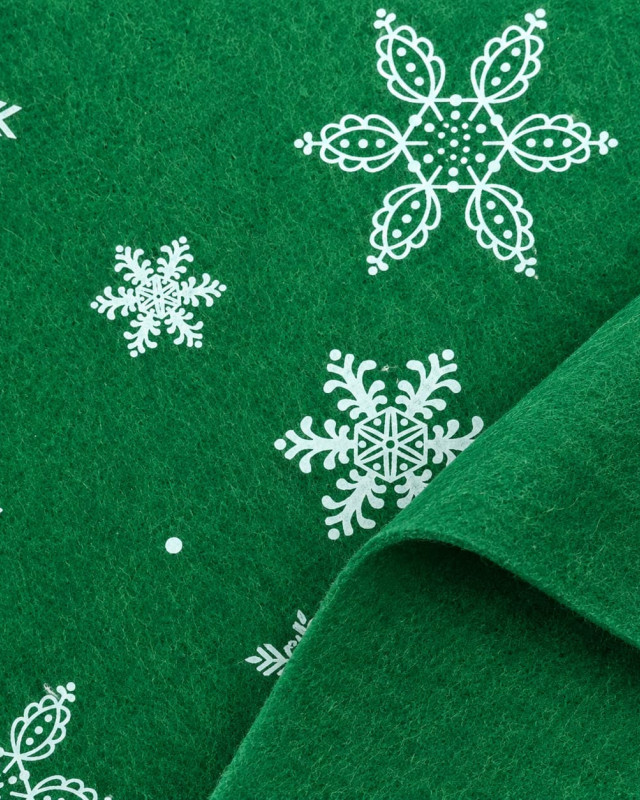 Feutrine verte flocons blancs – Tissu Noël | Mercerine