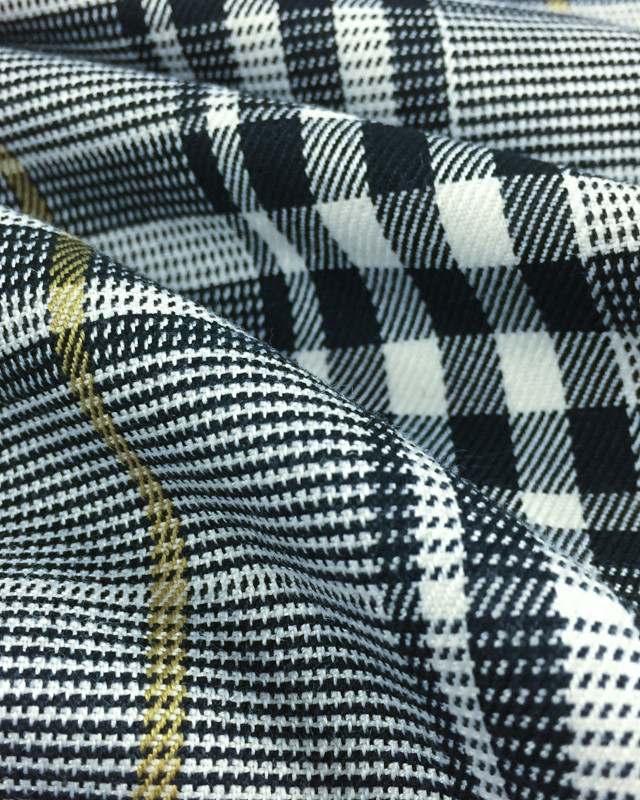Tissu tartan noir et blanc ligne ocre