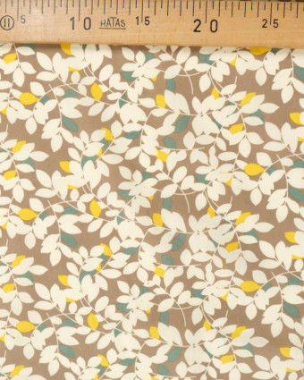 
Tissu Leona fleurie taupe  - Mercerine