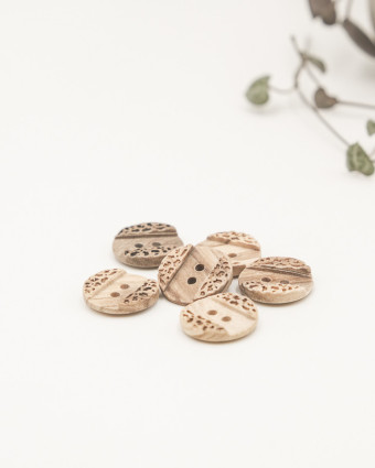 Bouton en bois martelé